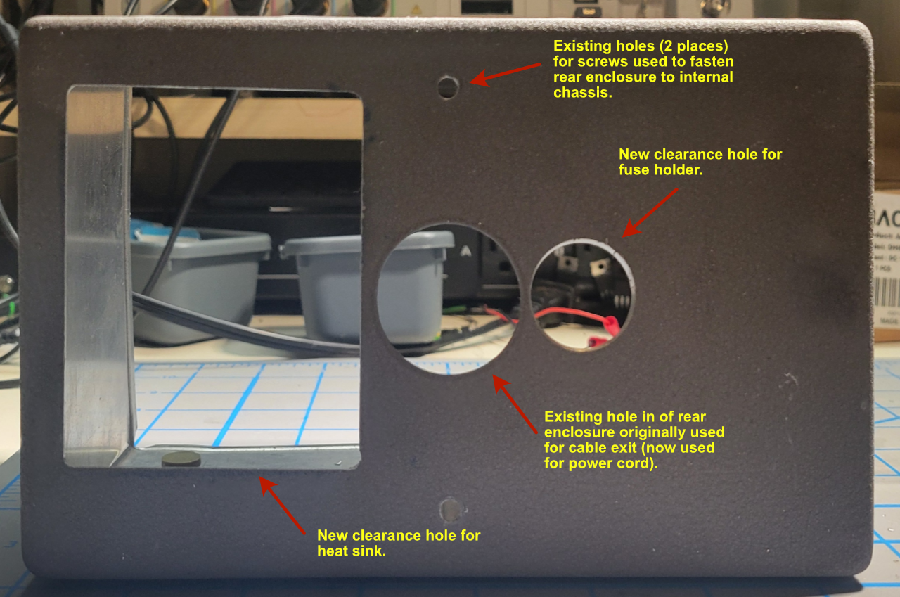 Q Multiplier rear enclosure reworked with additional openings for heat sink and fuse holder.